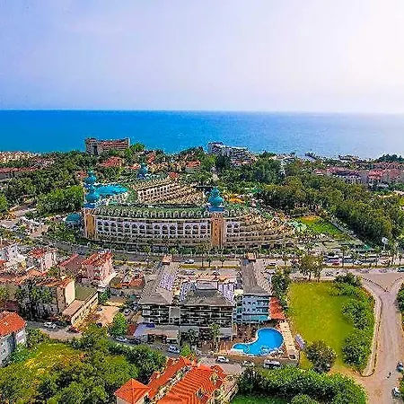 Отель Adella